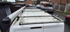 Roof rack by Rhino and van
