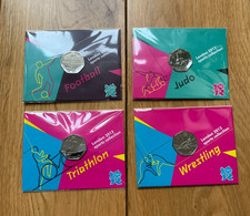 x4 ROYAL MINT carded olympic 50p coins FOOTBALL,JUDO,TRIATHLON and WRESTLING