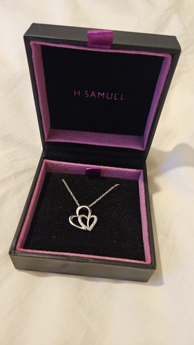 Samuels silver chain and - chain,