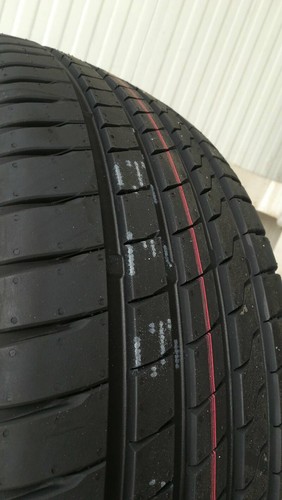215 97w tire - 215,