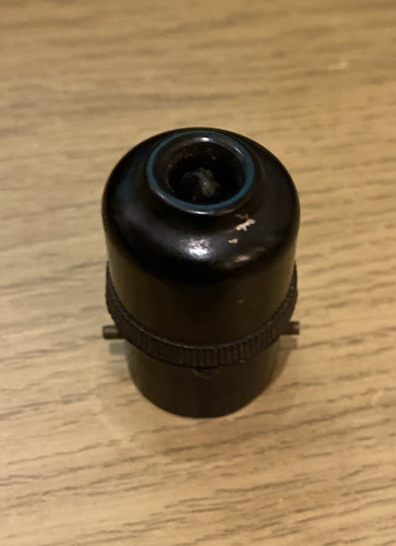 Bakelite round plug marked - bakelite,