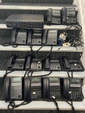 NEC phone system including 13 handsets & required cables. Great condition. 