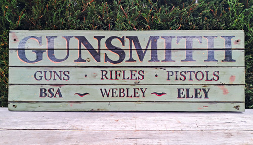 Signwritten wooden gunsmith - wooden,