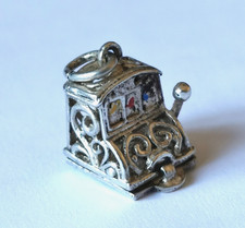 VINTAGE, NUVO, SILVER CHARM /