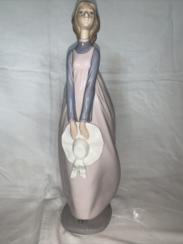 Nao lady with hat figurine - lady,
