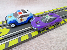 Micro Scalextric - DARK TITAN RACER & RYAN PATROL CARS