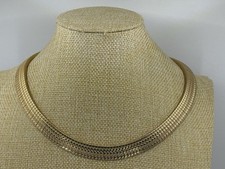 VINTAGE 1970s gold articulated
