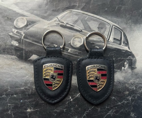 Two genuine porsche - genuine, keyrings