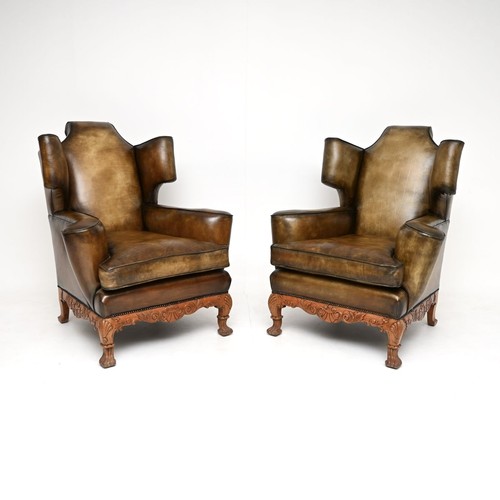 Pair antique leather wing - pair,