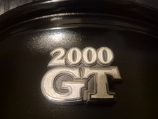 toyota celica ra25 / ra28 gt rear centre badge on rear between rear lights