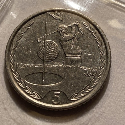 Isle man golfer coin - man,