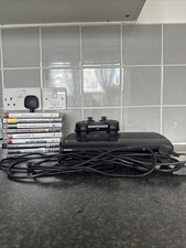 Sony PlayStation 3 Super Slim 500GB Black Console With Controller And Games