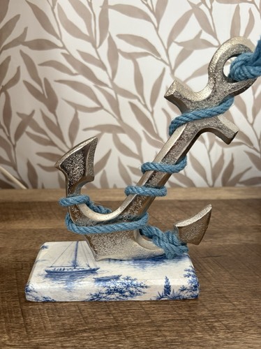Metal anchor wooden base - anchor, on