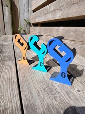 3 Coloured Watch Stands for