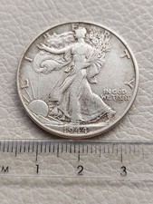 A 1944 USA United States Silver Walking Liberty Half Dollar Coin