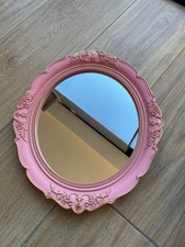 Medium sized oval pink and gold detailed mirror