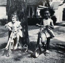 Little Girls on Scooter &