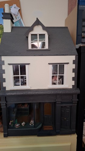 Anglesey dolls house - dolls,