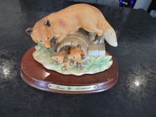 foxes ornament by LEONADO on stand