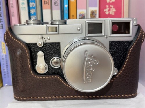 Stock handmade leather camera - stock,