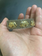 Silver and Gold Tone Bangle Bracelet, Decorated with Elephant Image