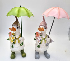 Duck Holding Flowers And