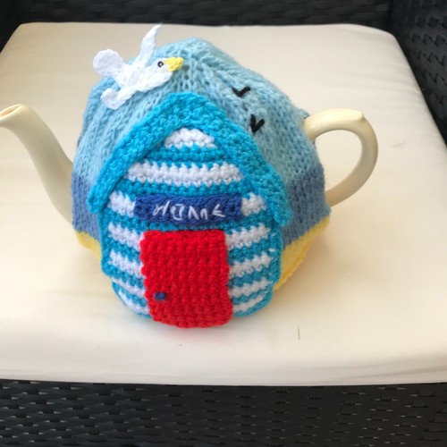 Hand knitted beach - hand, tea