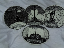 The set of four  seasonal decorative plates  a design by Rob Ryan,  "Our Place"
