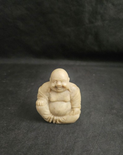 Hand carved buddha - hand,