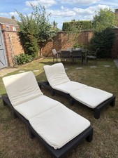 2 x Black Rattan Sun loungers And Cushions