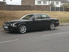 JAGUAR XJ SOVEREIGN 2. 7 TDVI V6 IN BLACK WITH CREAM LEATHER SUPERB