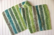 Hand knitted shorter length scarf self-striping soft yarn shades of green stripe