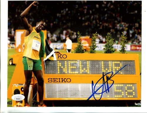 Usain bolt autographed 8x10 - bolt,