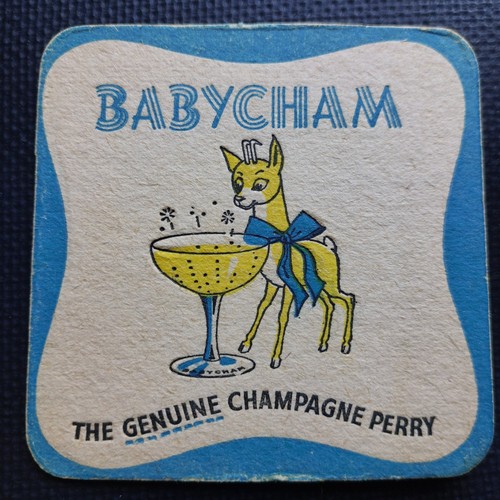 Babycham beer mat showerings - beer,