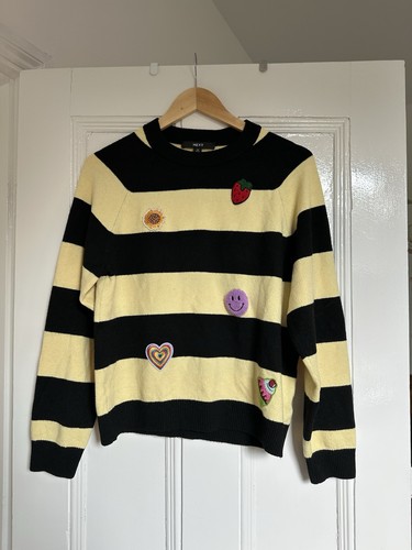 Next yellow black striped - next,