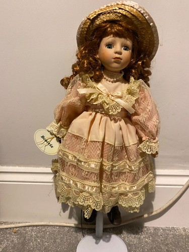 Small vintage porcelain doll - small,