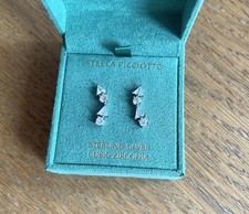 STELLA PICCIOTTO & Sterling