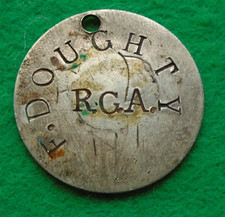 ROYAL GARRISON ARTILLERY F. DOUGHTY R.G.A dog tag on  Victoria silver rupee