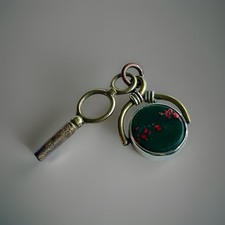 Antique Gold Metal Spinning Watch Fob And Watch Winding Key Green & Red Stone