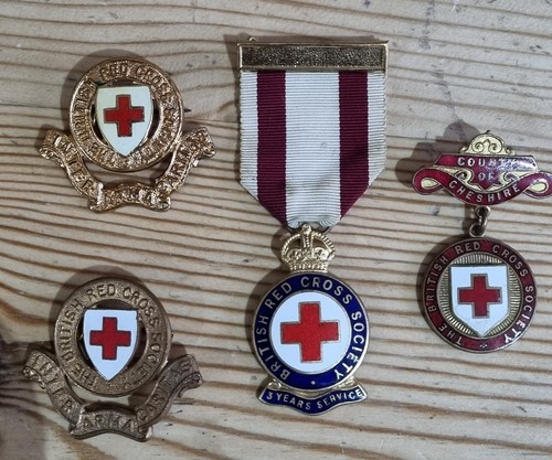 Red cross badges and pins - red,