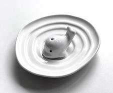 Lovely white pottery swimming