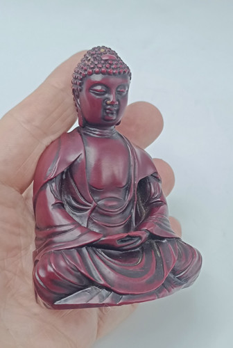 Vintage cast red - resin, seated