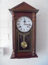 Highlands Mechanical Mahogany Stained Wall Clock & Key