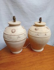 A Pair Of Large Ceramic Roman