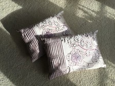Two Decorator cushions with
