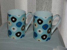 A Pair of Mugs with Squares