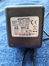 ADAPTOR MODEL: WJB-Y351202200 D / OUTPUT: 12V DC -200mA