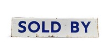 SOLD BY enamel advertising sign, double sided, c. 1910.