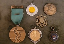 Vintage football/tennis medals