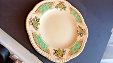 Side plate with the "Kathleen" pattern by Myott of Staffordshire England.
